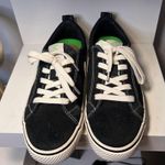 Cariuma Black Canvas Sneakers‎ with White Stripe Detail & Green Inner Sole Photo 0