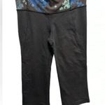 Lululemon BLACK FLORAL FLARE CROPPED CAPRI LEGGINGS Photo 1