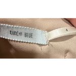 Urban Outfitters KIMCHI BLUE Cream Black Floral Button Back Romper Photo 2