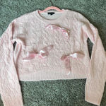 Chic Light Pink Cable Knit Sweater with Ribbon Accents Photo 0