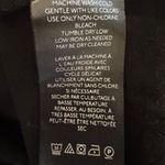 Maeve  by Anthropologie Women's Black Short Sleeve Blouse with Ruffle Hem Sz L Photo 3