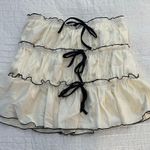 White Mini Skirt w/ Black Detials Photo 0