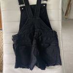 Women size small Black Jean romper overall short with distressed hem and areas Photo 4