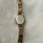 Armitron Now Gold Tone Ladies Watch Black Dial Oval Face Stainless Steel Photo 4