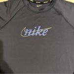 Nike Women's Standard UPF 40+ Long Sleeve Rashguard Swim Tee Photo 1