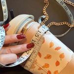 Skinny Dip Pumpkin Spice Latte vegan leather bucket bag, chain strap crossbody Tan Photo 6