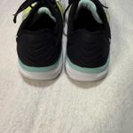 New Balance White and Black Athletic Shoes with Lime Accents Photo 3