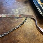 Navy Blue Crossbody handbag! Cutout faux leather detailing with a chain strap Photo 1