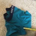 Nike Pro woman’s size XS teal and navy shorts Photo 6