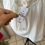 Millau white tank top with peach embroidered flowers on the back size medium NWT Photo 4