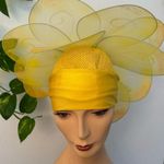 Handmade yellow floral hat. This hat was made for the stage in the theater. Photo 1