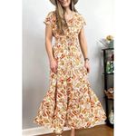 Amazon Kilig  yellow floral smocked midi dress small Photo 1