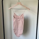 Urban Outfitters  Out From Under Ribbed Bodysuit in Cream Beige Photo 1