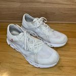 On Running Women's Cloud X 4 AD in White / Wolf Photo 1