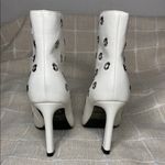 Anne Michelle Womens White Ankle Boots Pointed Toe Stiletto Heel Grommet Accents Photo 3