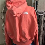 The North Face Emberglow Orange Never Stop Exploring Cropped Hooded Sweatshirt Photo 5