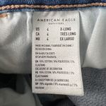 American Eagle  High Rise Jegging X-Long Sz 4 Distressed Whiskered Medium Wash Photo 9