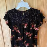 Jolt  Black Top with Vibrant Floral Accents Photo 3