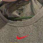 Nike  Women's Gray Long Sleeve Tee with Bold Print Photo 3