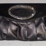 SILVER CLUTCH FAUX LEATHER RHINESTONE DESIGN 2 SNAP CLOSURE
ZIP POCKET OUTSIDE Photo 0