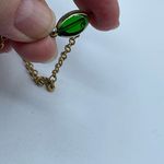 Vintage Mr. We 1970’s green glass gold tone long necklace. Photo 3