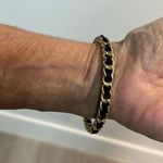 Steve Madden Gold Bangle Interlaced with Black Leather Photo 0