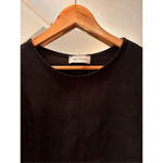 Stylish Ces Femme black top featuring bell sleeves, Size Medium Photo 1