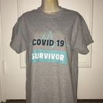 Gildan  Graphic Tee Size Medium T-Shirt Photo 0