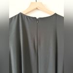 Eloquii  Sleeveless Jumpsuit with Asymmetrical Peplum in Black - Size 14 Photo 4