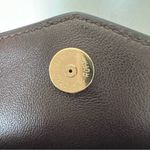 The Row Envelope Large Crossbody in Natural Nappa Saddle Leather Dark Brown Photo 10