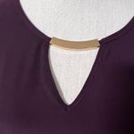 AUW  size Large sleeveless shirt; plum purple with gold accent; never worn Photo 3