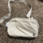 Lululemon  Belt Bag 1L Wordmark Color White Opal/Raw Linen/White Photo 1