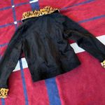 Cute y2k Black suede like jacket with cheetah print collar and cuffs
Women’s S Photo 3