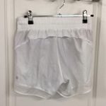 Athleta Mesh Racer Run Shorts 4” Photo 1