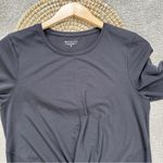 Athleta Women’s Essence Twist Top Shirt Longsleeve Thumbholes in Black Size M Photo 3