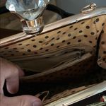 Elegant Black and Red Floral Satchel with Structured Design Photo 7