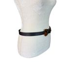 Women's unbranded black leather adjustable belt with animal print buckle Photo 2