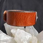 Leather EUC snap bracelet with silvertone medallion and CZ center stone Brown Photo 3