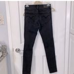 Levi's 711 Skinny Jeans In Washed Black Distressed Wash Photo 1