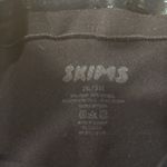 SKIMS  black one leg shape wear size 2XL. Photo 1