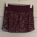 Athleta Stylish  Women's  Run With It 14” Skirt in Purple Print Photo 0