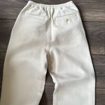 Uniqlo  emits ivory high waisted stretchy oversized pants Photo 5