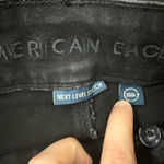 American Eagle Next Level Stretch Super High-Rise Flare Black Jeans Size 6 Photo 4