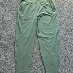 Athleta green Run with It jogger wind pants size S Photo 1
