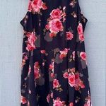 Navy floral romper with pleated pockets Photo 0