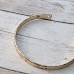 Almost A Brassy Shade of Gold Tone Cuff Bracelet Photo 4