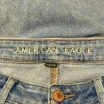 American Eagle ⭐️  light wash distressed mom jeans in size 4 Photo 3
