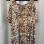 Veronica M  - shirt with shoulder cut out. Photo 0