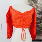 Urban Outfitters  Cropped Drawstring Top in Papaya Size Large NWOT Photo 0