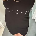 Black Dress With Pearls Around Waist Photo 1